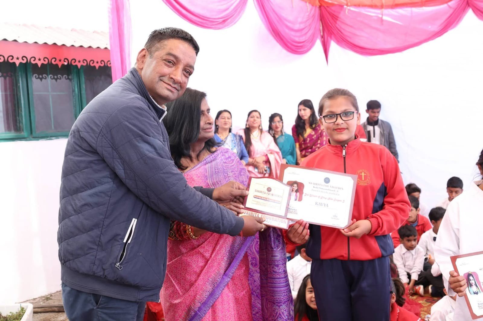 Principal presenting a certificate
